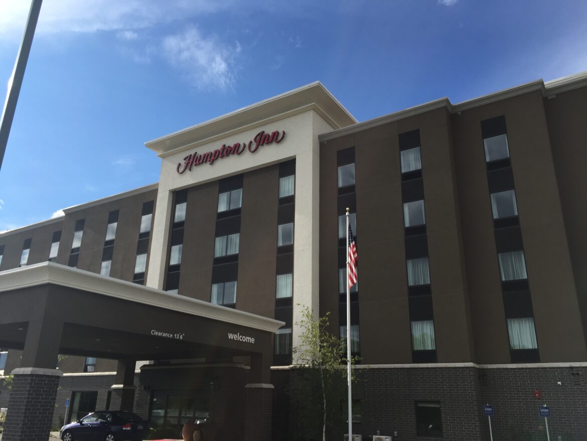 a building with a flag in front of it
