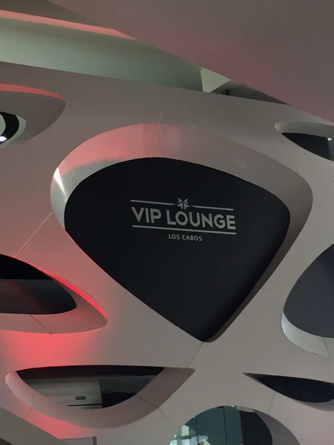 a black and white sign with white text