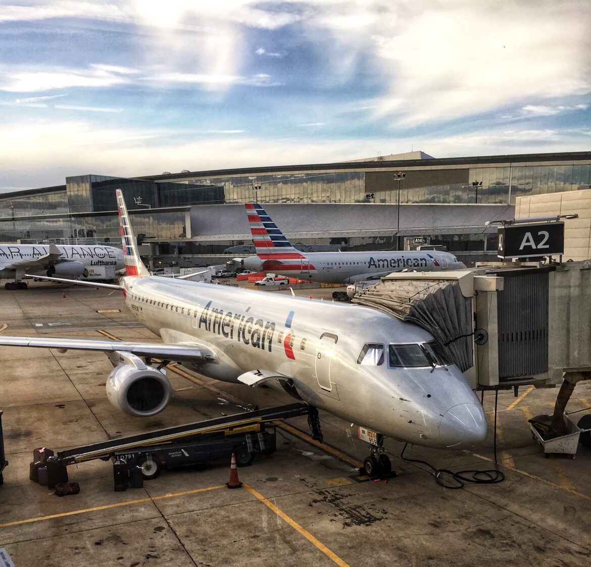airplanes parked at an airport