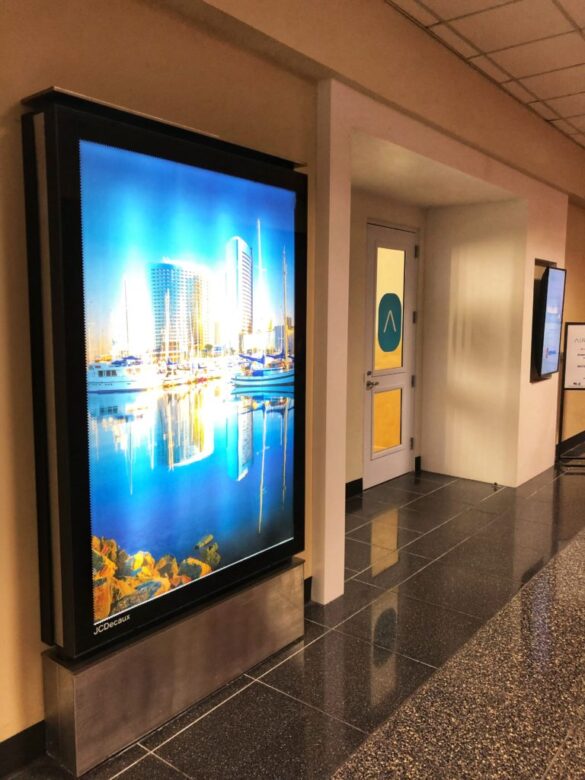 a large screen in a hallway
