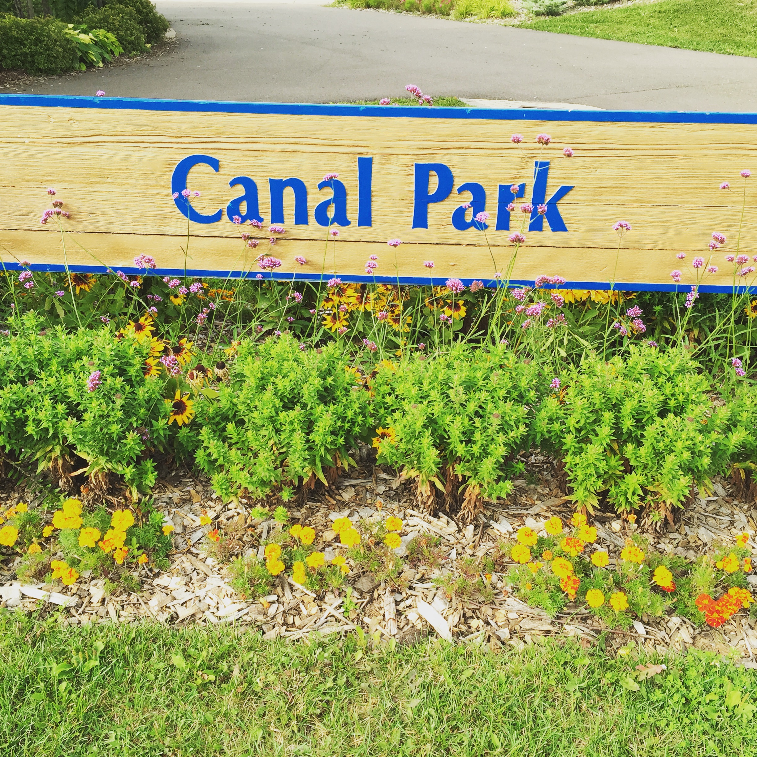 a sign in a garden