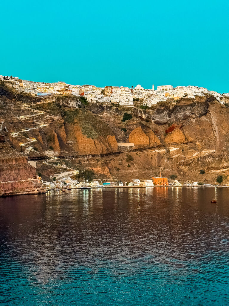 Santorini from the water at golden hour